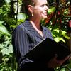 Beverly Mason performing garden wedding in Beaverton. Oregon wedding minister. Ceremony and photography by Radiant Touch Weddings officiant