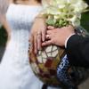 wedding rings hands photo at Grand Lodge wedding in Oregon by Beverly Mason