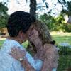 bride and groom share a kiss. painter effect portrait