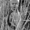 boy in the ice covered brush